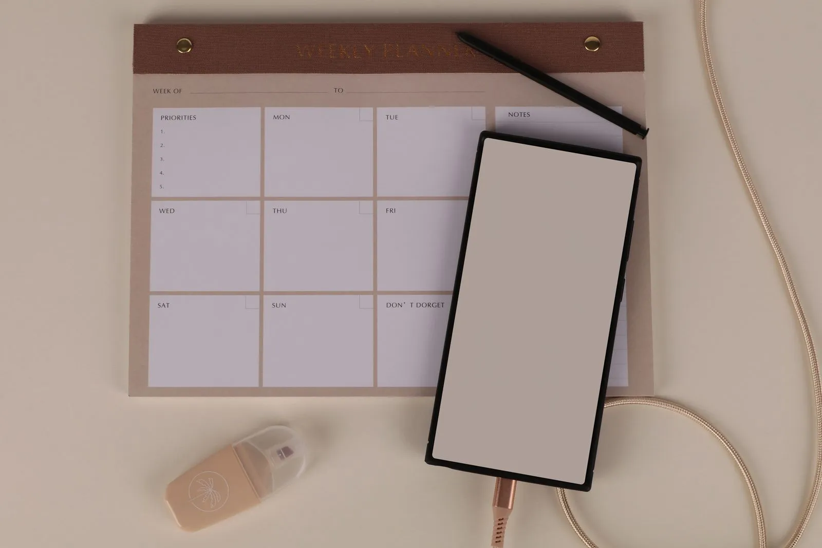 A paper wall calendar with days marked off