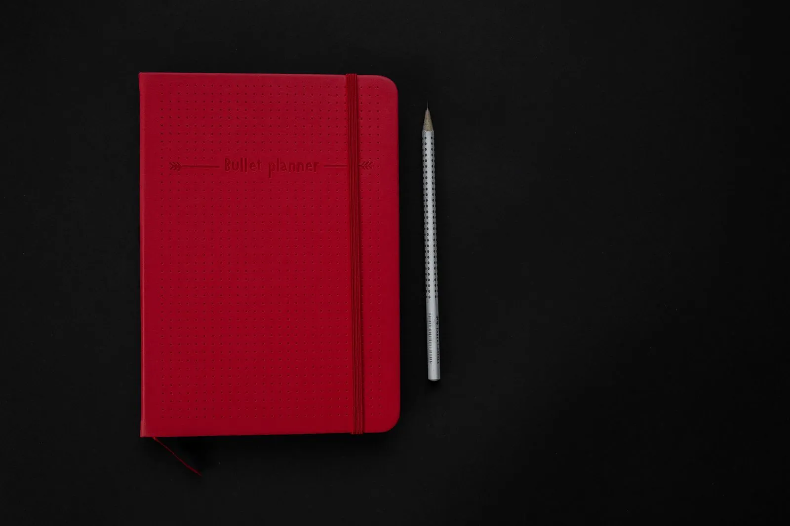 A notebook and pen on a calm desk